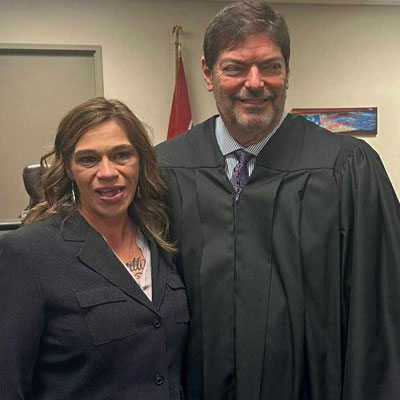 Gibson County Juvenile Court Judge Mark Johnson with Safe Baby Court Graduate, Stacey.