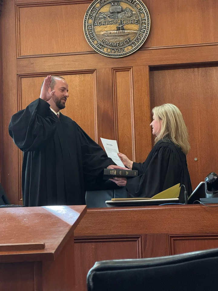 Circuit Court Judge Chris Frulla is sworn in by Court of Appeals Judge Valerie Smith