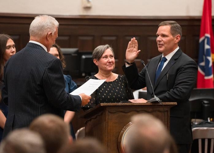 Judge David Veile is sworn in by retired Judge Michael Binkley