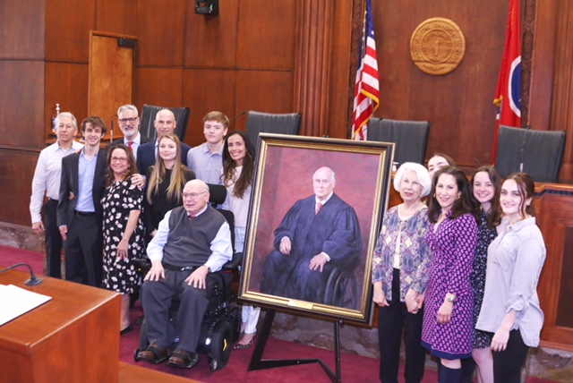 Judge Charles D. Susano, Jr. with family at his portrait unveiling