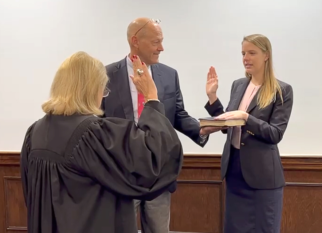 Chancellor Pamela Fleenor, Philip Fleenor and Christina Michelle Fleenor at her swearing-in ceremony