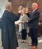 Judge Terry Fann is sworn in by retired Judge Mark Rogers